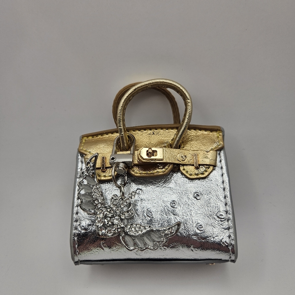 Elegant Silver and Gold Women's Mini Handbag. Charm Included.